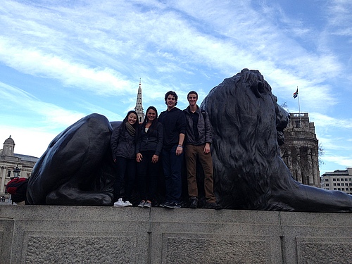 Ashley, Camille, Corey, and Devin at Trafalgar Square with one of the iconic bronze lion statues.