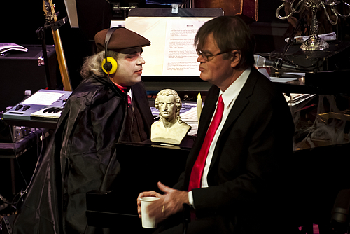 Schiller appears on the live Halloween broadcast of “A Prairie Home Companion” hosted by Garrison Keillor, right, accompanied by Rich Dworsky.
