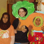 Erin poses with two students from Abu Sir Girl-Friendly School.