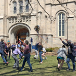 Students and community members dance around a maypole following a service in Skinner Chapel.