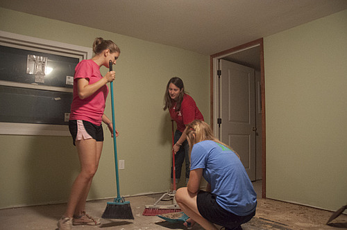 Fellows help Growing Up Healthy renovate a building for a new community center.