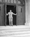Larry Gould welcomes students at the Chapel doors
