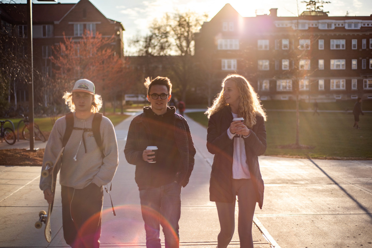 Brennan Johnson '21, Cole Hanson '21 and Izzy Bascom-Anderson '21 take a sunset walk around campus.