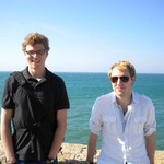 Cadiz: Andrew Tiano and Niall Bachynski pose in front of the ocean in Cadiz, Spain.