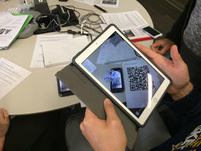 Image of a student using the BiochemAR app on an iPad.