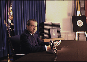 Richard Nixon at his desk.