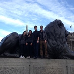 Ashley, Camille, Corey, and Devin at Trafalgar Square with one of the iconic bronze lion statues.