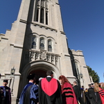 Faculty congregate outside the Chapel at the conclusion of Opening Convocation.