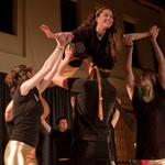 Laura Karson '13 being lifted up by her fellow dancers.