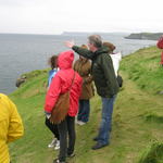 Our fearless guide and historian, Peter Collins, keeps us safe at the Carrick-a-Rede Rope Bridge on a very blustery day.