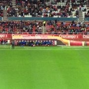 The players sit inside a giant bottle of Cruzcampo beer...that can't be conducive to good soccer