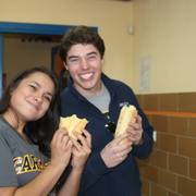 Camille and Mitch enjoying the bread with sugar and olive oil.