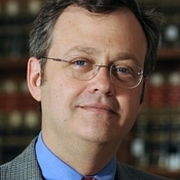 Portrait of University of North Carolina law professor Eric Muller.