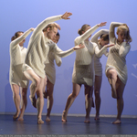 Dancers wearing white dresses